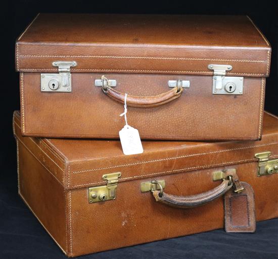 Two leather suitcases